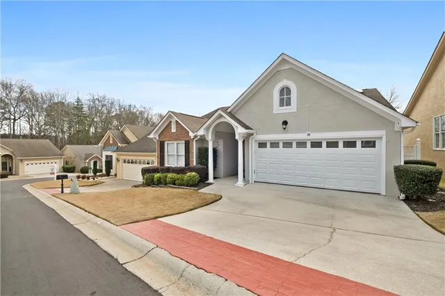 a front view of a house with yard