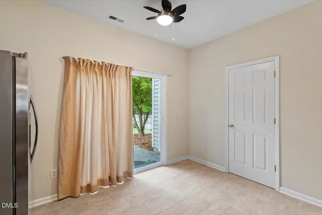 a kitchen with stainless steel appliances granite countertop a refrigerator stove and microwave