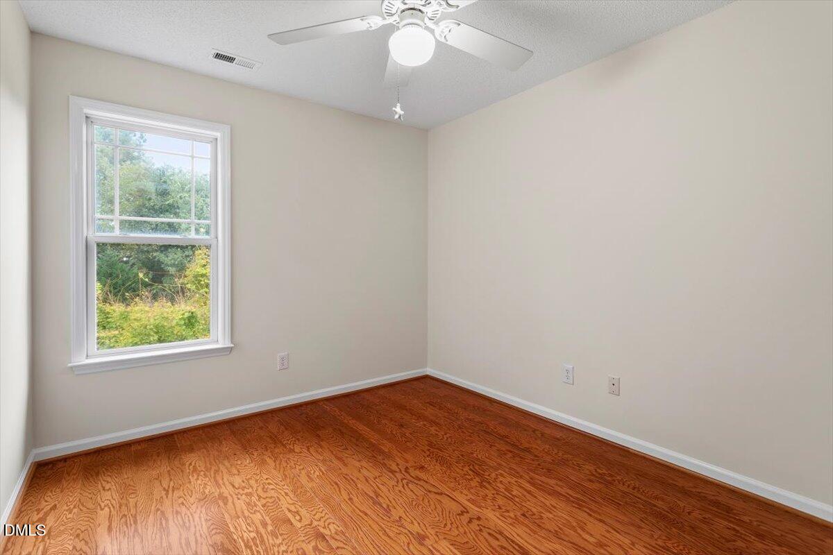 1039 Dual Parks Road Apex, NC 27502 - Photo 22 of 46 an empty room with a window