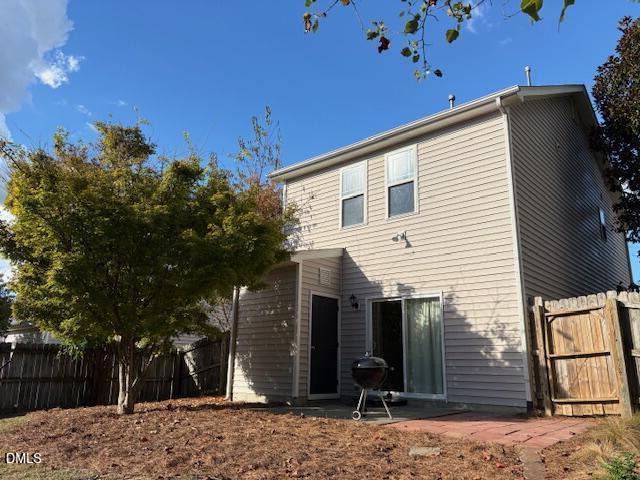 1039 Dual Parks Road Apex, NC 27502 - Photo 33 of 46 a view of a house with a backyard