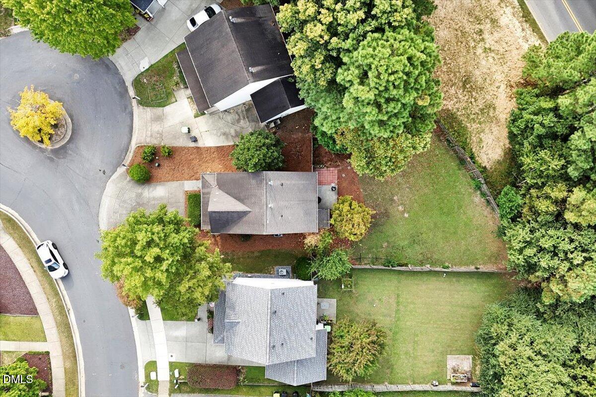 1039 Dual Parks Road Apex, NC 27502 - Photo 44 of 46 an aerial view of a house with outdoor space