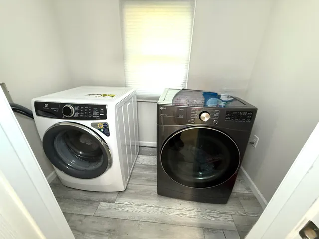 a utility room with dryer and washer