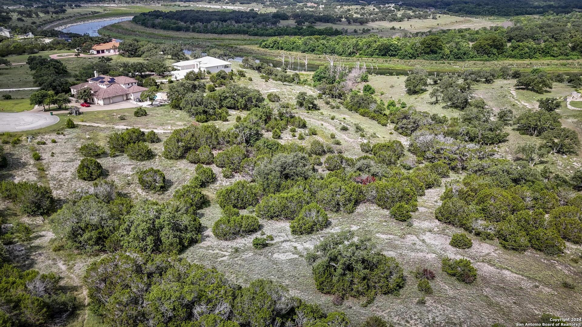 228 Enigma Avenue Spring Branch, TX 78070 - Photo 22 of 39 a view of a garden with flowers