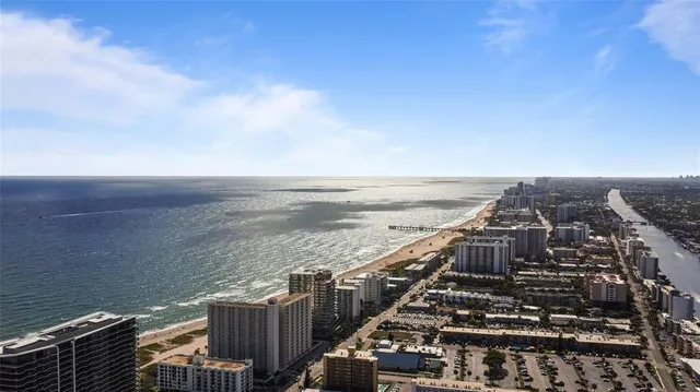 a view of a buildings in front of house