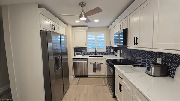 $3,500 | 12945 Vanderbilt Drive, Unit 402, Naples, FL 34110