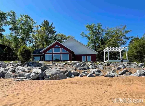 $875,000 | W3602 Squaw Beach Road, Big Bay, MI 49808