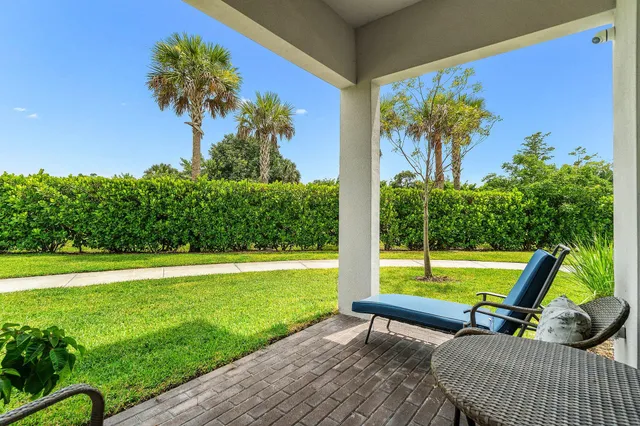 a view of a swimming pool with a lounge chairs