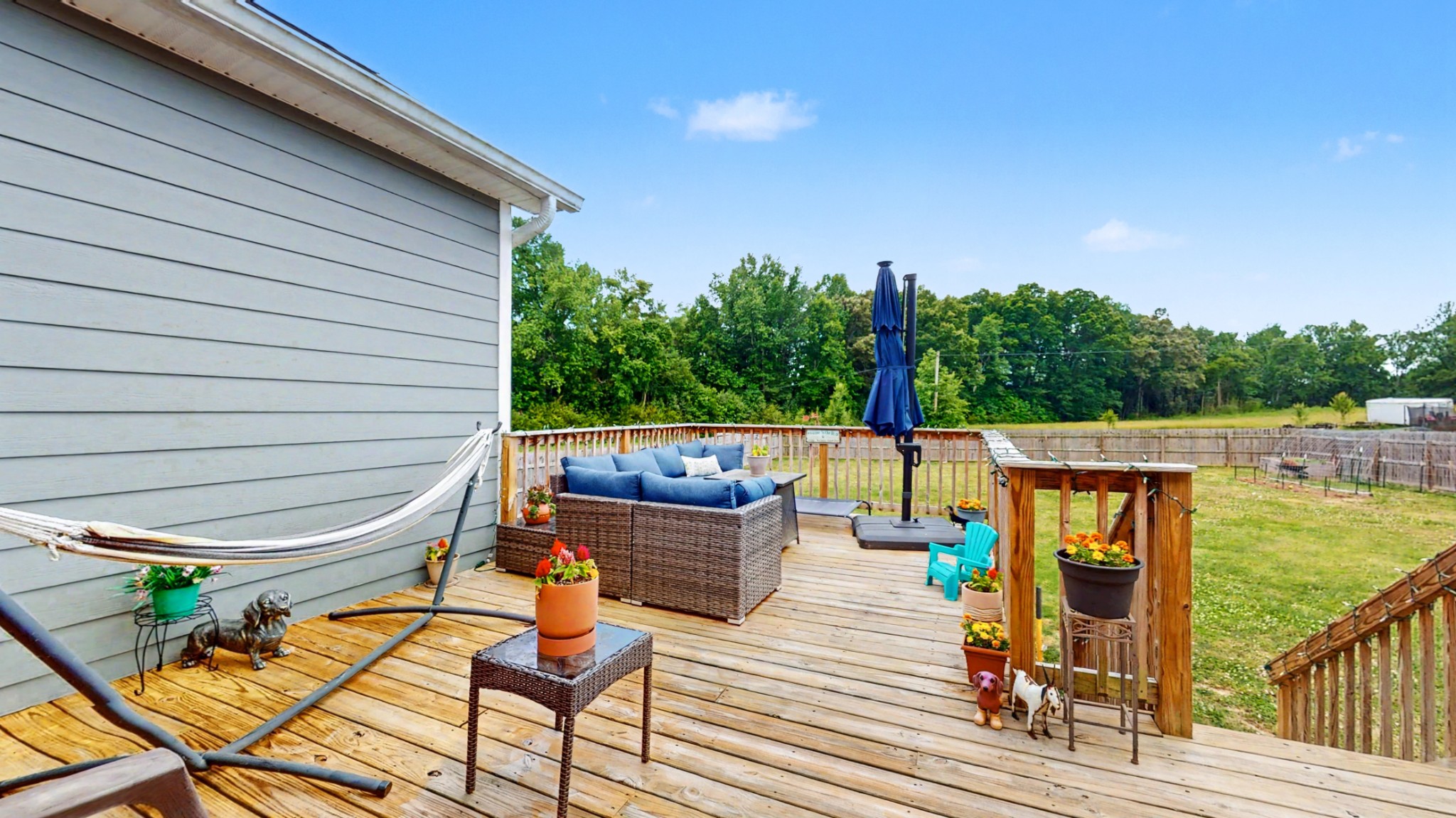 601 King Ridge Road Dowelltown, TN 37059 - Photo 38 of 49 a view of a patio with chairs and wooden floor