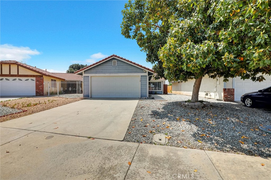 769 Don Drive Hemet, CA 92543 - Photo 1 of 27 a house with a tree in front of it