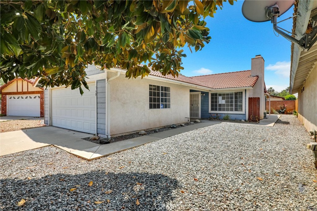 769 Don Drive Hemet, CA 92543 - Photo 3 of 27 a front view of a house with a yard