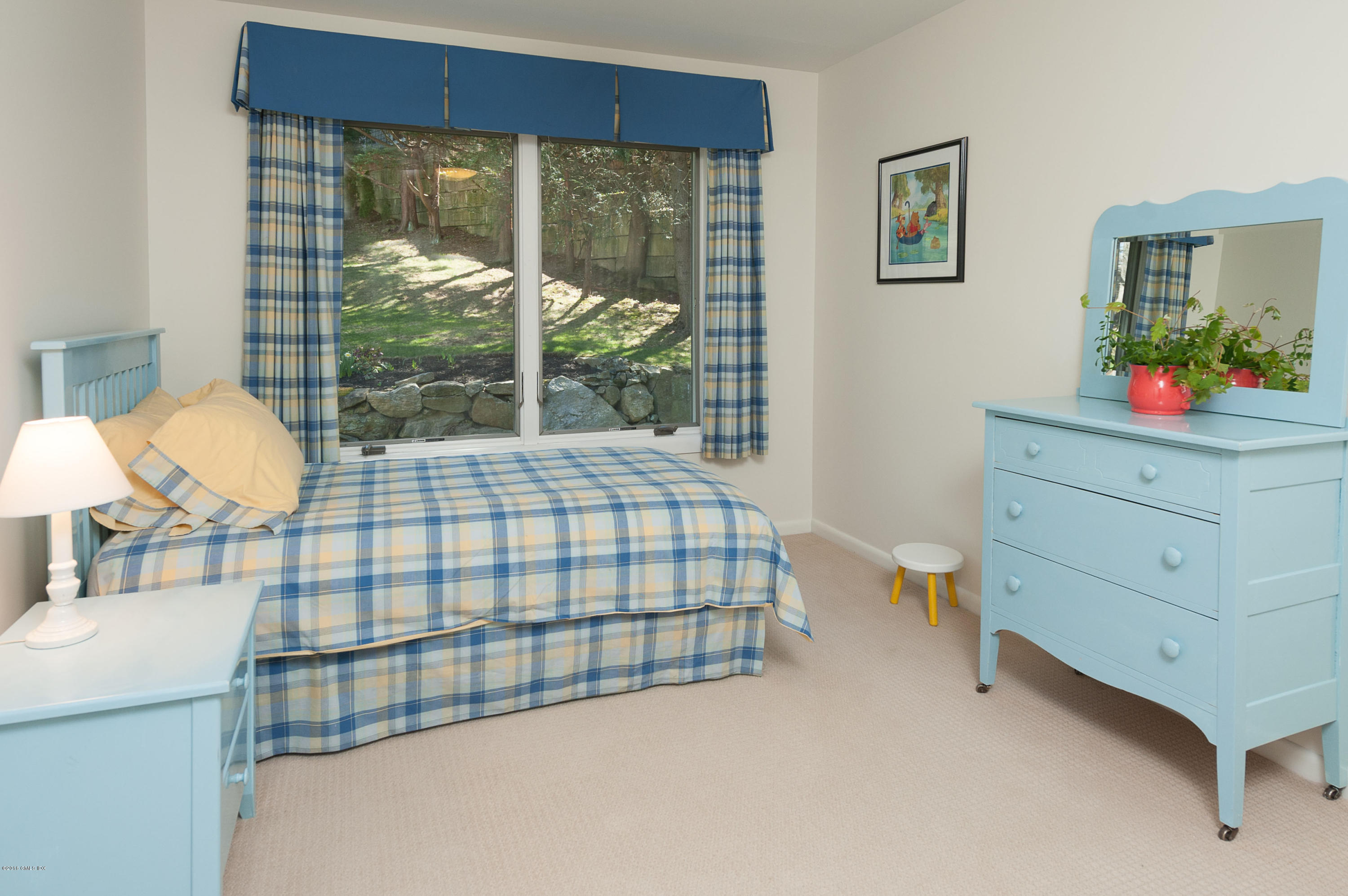 57 Long Meadow Road Riverside, CT 06878 - Photo 14 of 18 a bedroom with a bed and a window