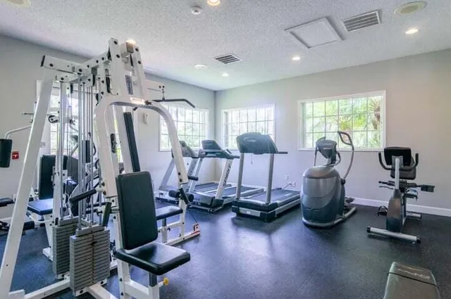a view of a room with gym equipment