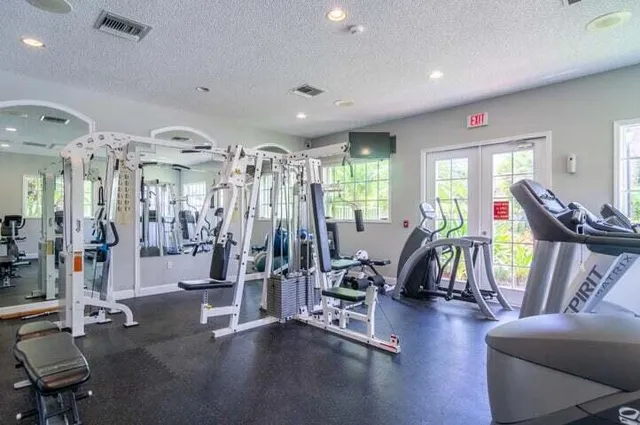 a view of a room with gym equipment