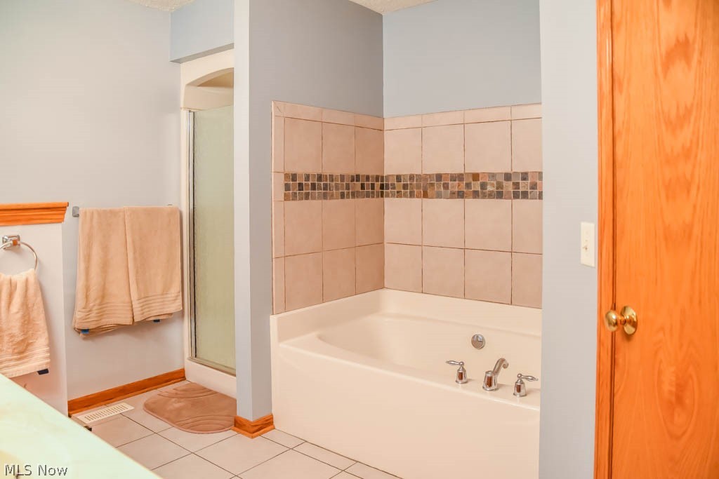 7004 Sweetwater Road Northeast Canton, OH 44721 - Photo 14 of 35 The master bath has a soaking tub and separate shower!
