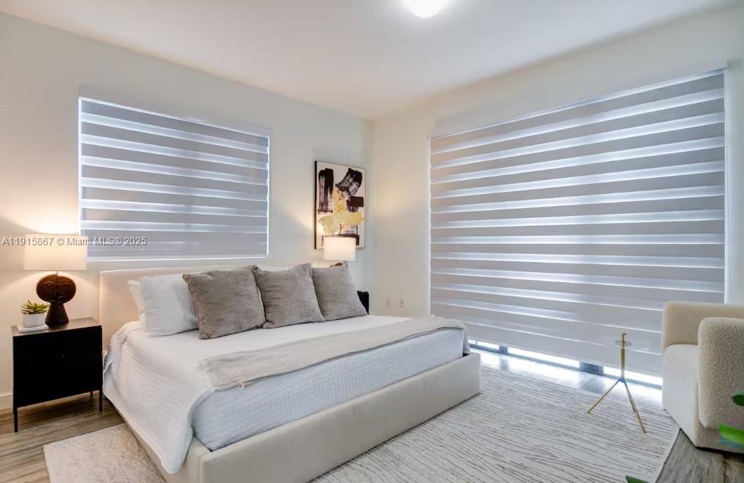 2955 Bird Avenue, Unit PHA Miami, FL 33133 - Photo 10 of 24 a bedroom with a bed and a window