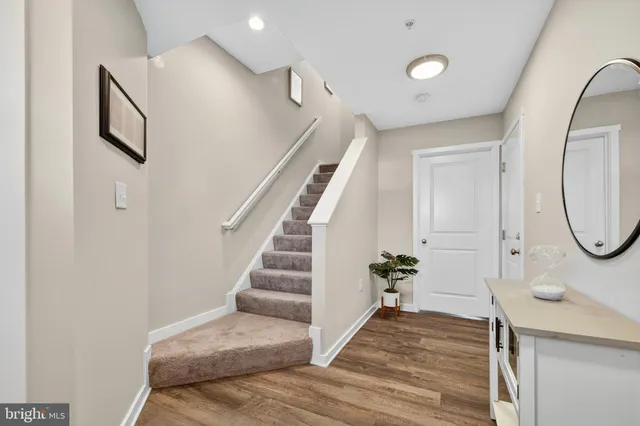 a view of a hallway with staircase