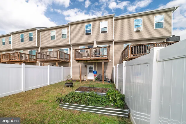a view of residential houses with city view