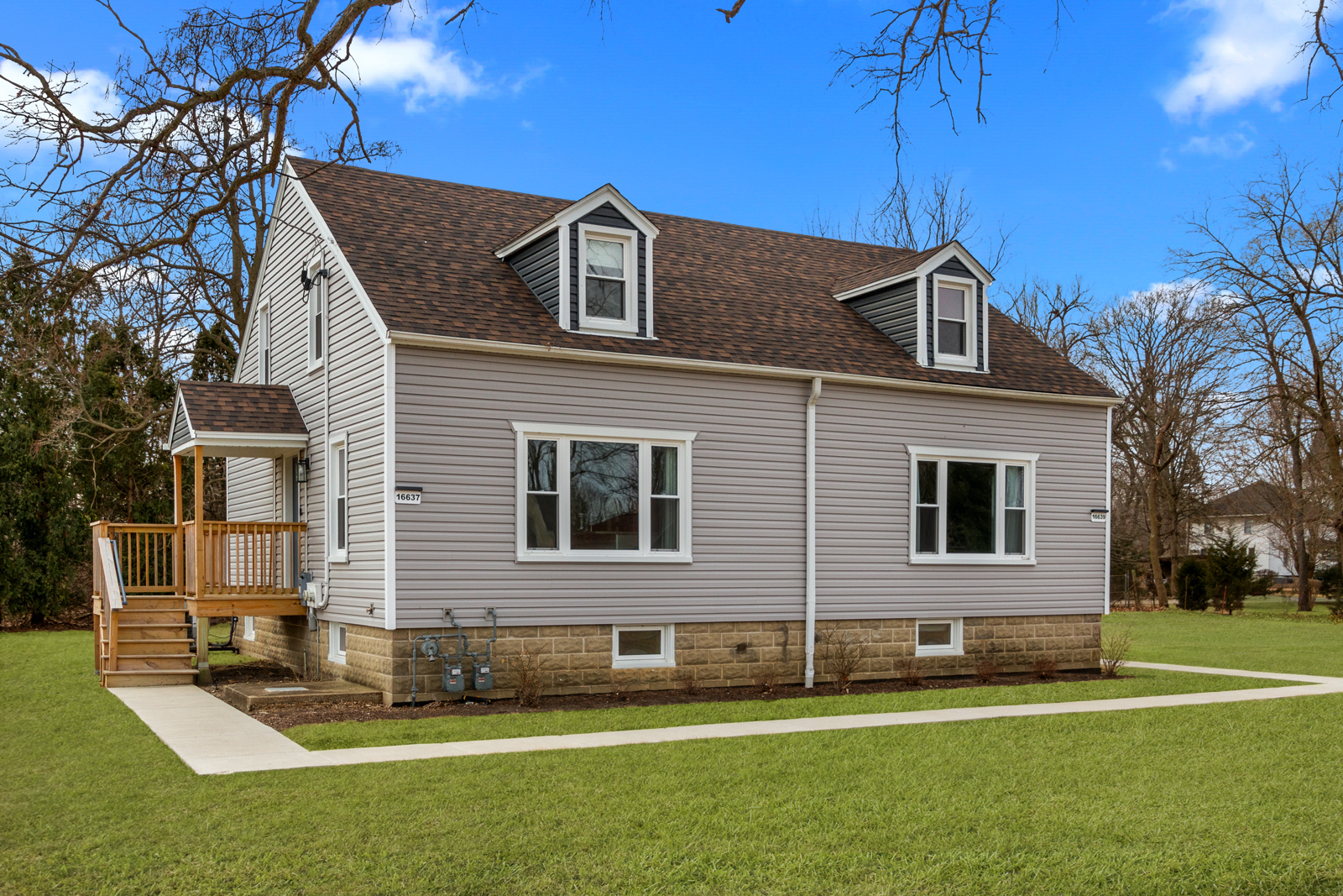 16637 West Brockman Avenue Lincolnshire, IL 60069 - Photo 1 of 35 a front view of a house with a yard