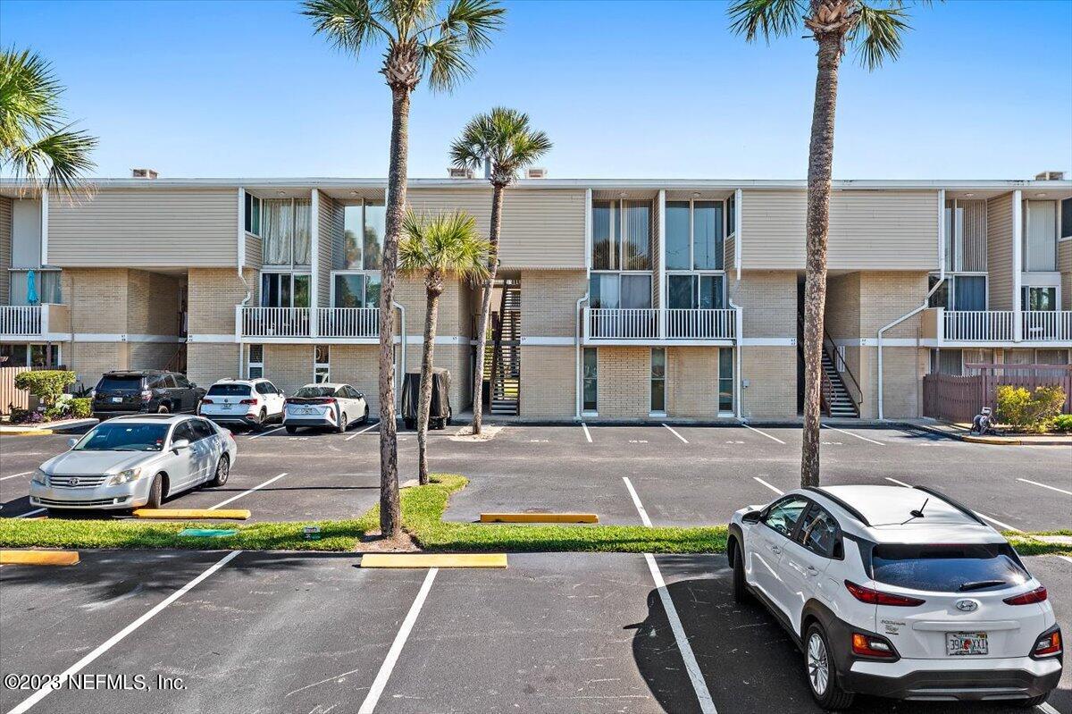 901 Ocean Boulevard, Unit 64 Atlantic Beach, FL 32233 - Photo 1 of 26 a front view of a house with sitting area