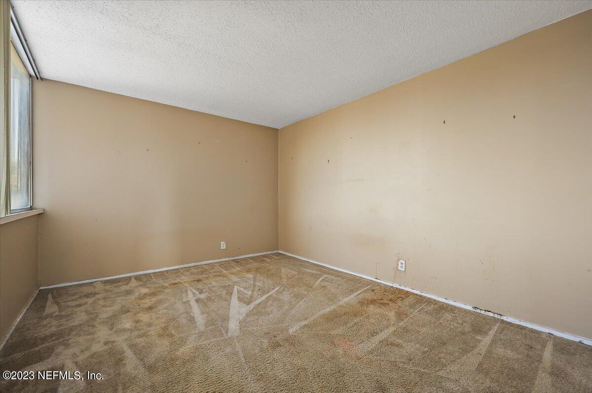 901 Ocean Boulevard, Unit 64 Atlantic Beach, FL 32233 - Photo 14 of 26 a view of an empty room