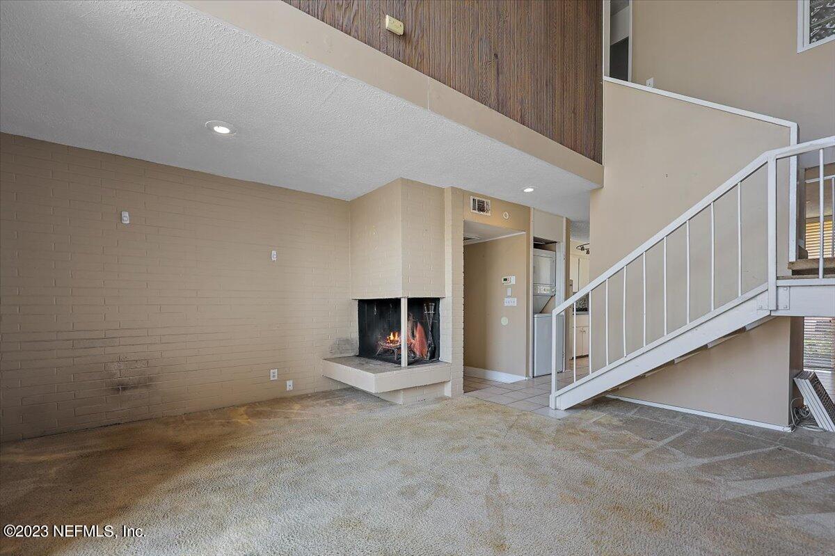 901 Ocean Boulevard, Unit 64 Atlantic Beach, FL 32233 - Photo 7 of 26 a view of an entryway with stairs