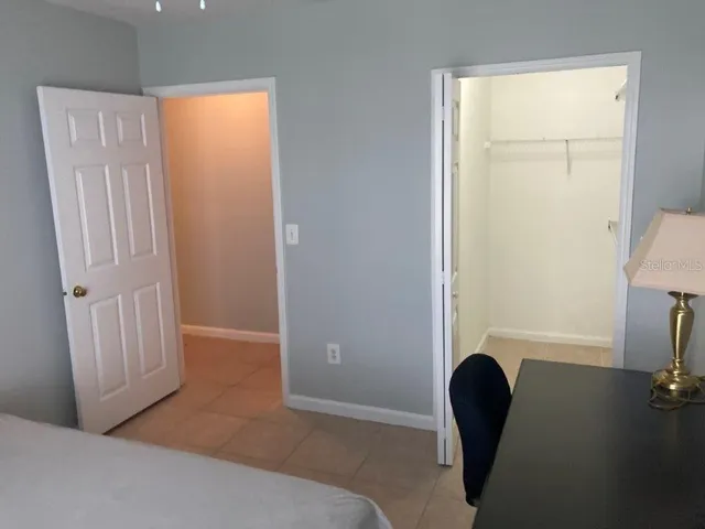 a view of livingroom with furniture and a window