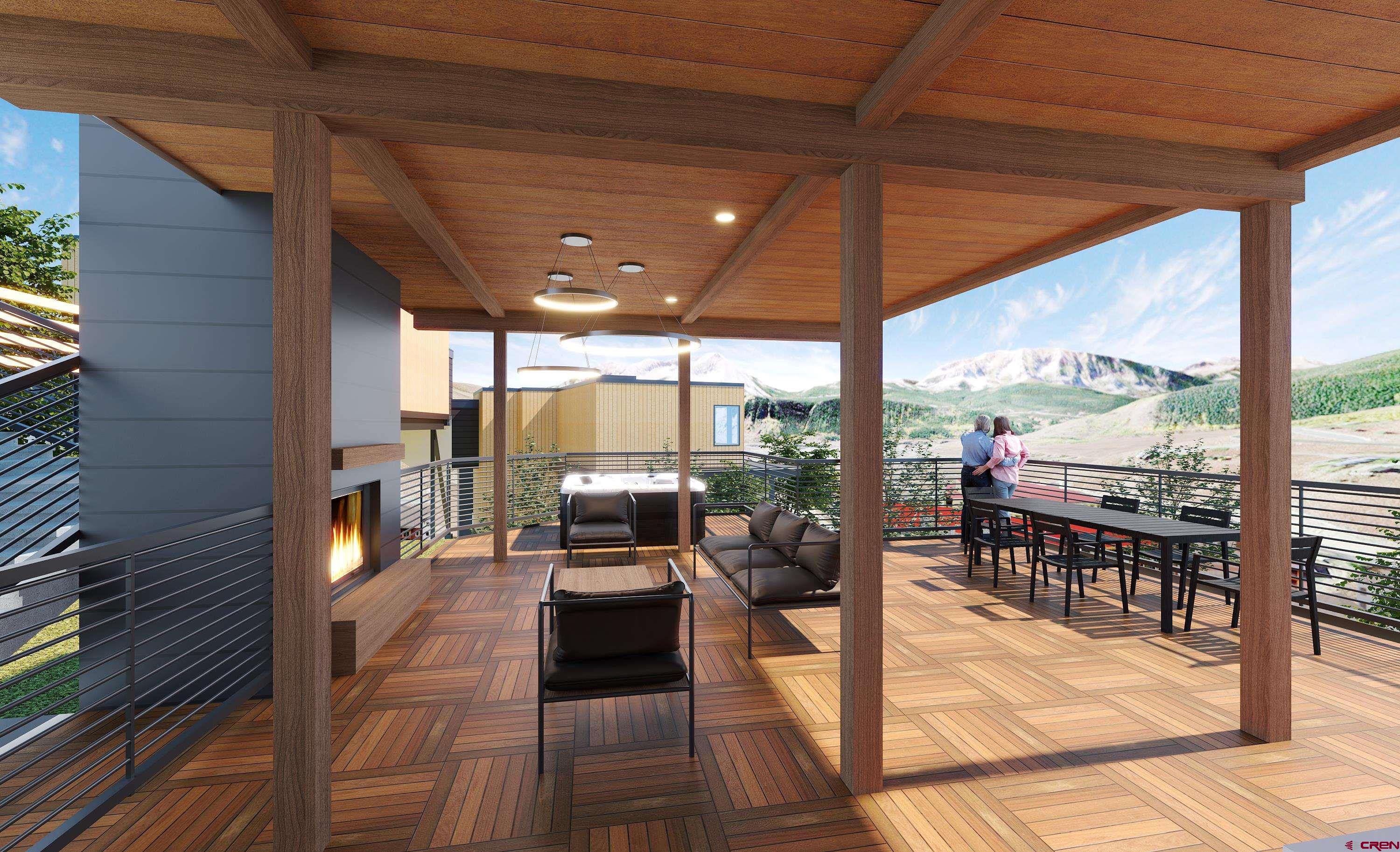 63 Cinnamon Mountain Road Crested Butte, CO 81225 - Photo 18 of 45 a view of a patio with a dining table chairs and iron stairs