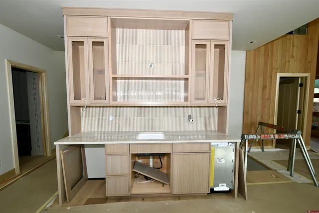 a bathroom with a bathtub and shower