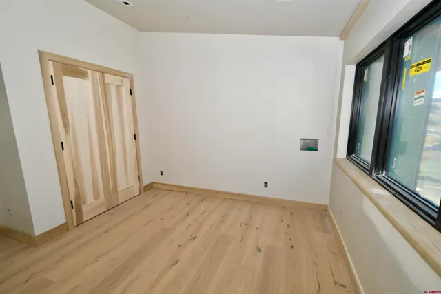 an empty room with windows