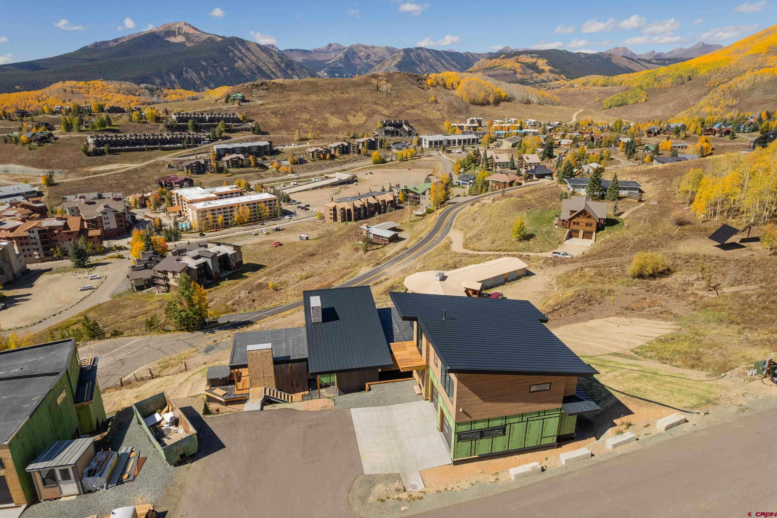 63 Cinnamon Mountain Road Crested Butte, CO 81225 - Photo 6 of 45 an aerial view of residential houses with outdoor space