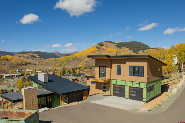 a view of a city with an ocean