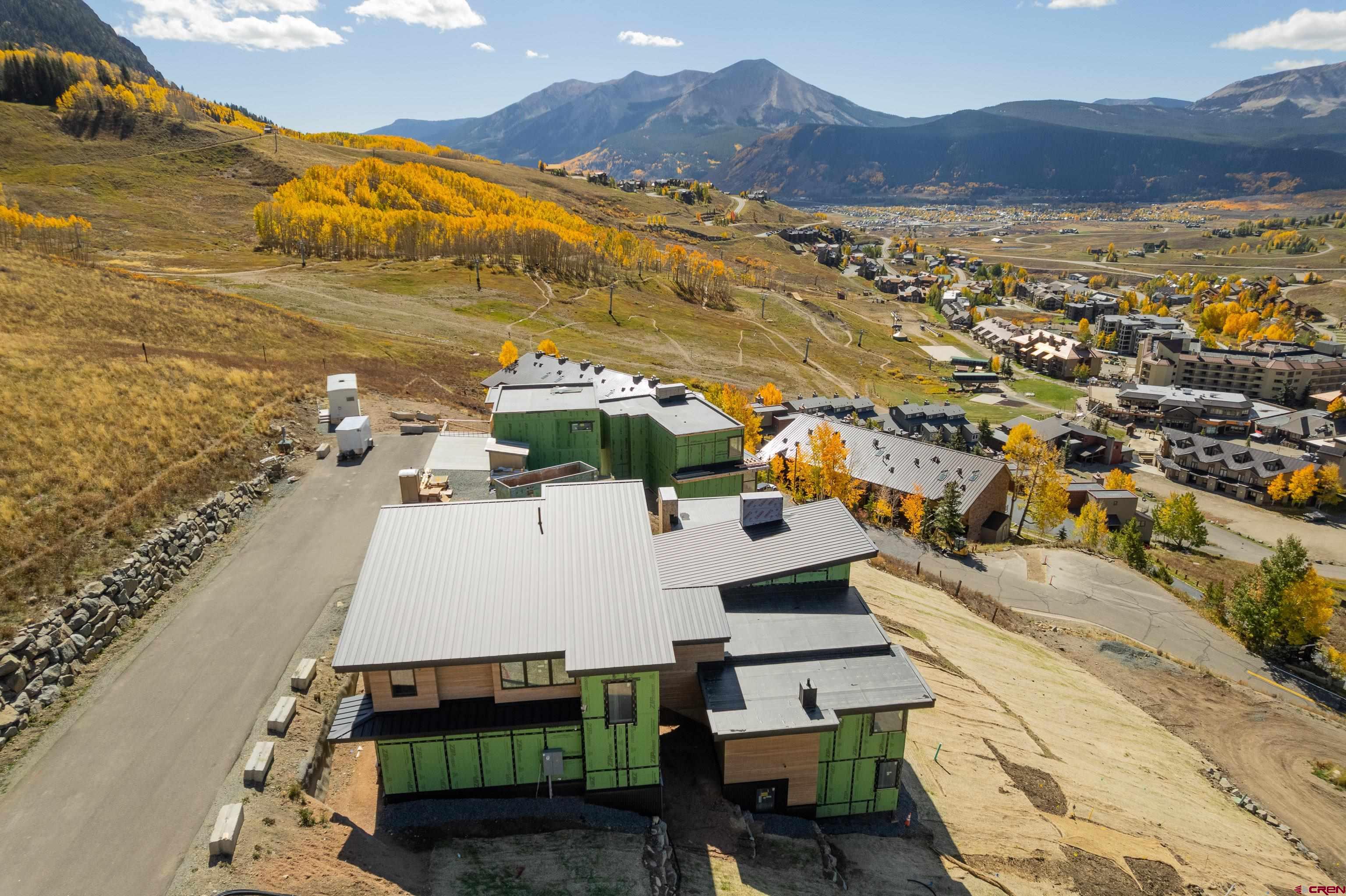 63 Cinnamon Mountain Road Crested Butte, CO 81225 - Photo 8 of 45 a view of a city with an ocean