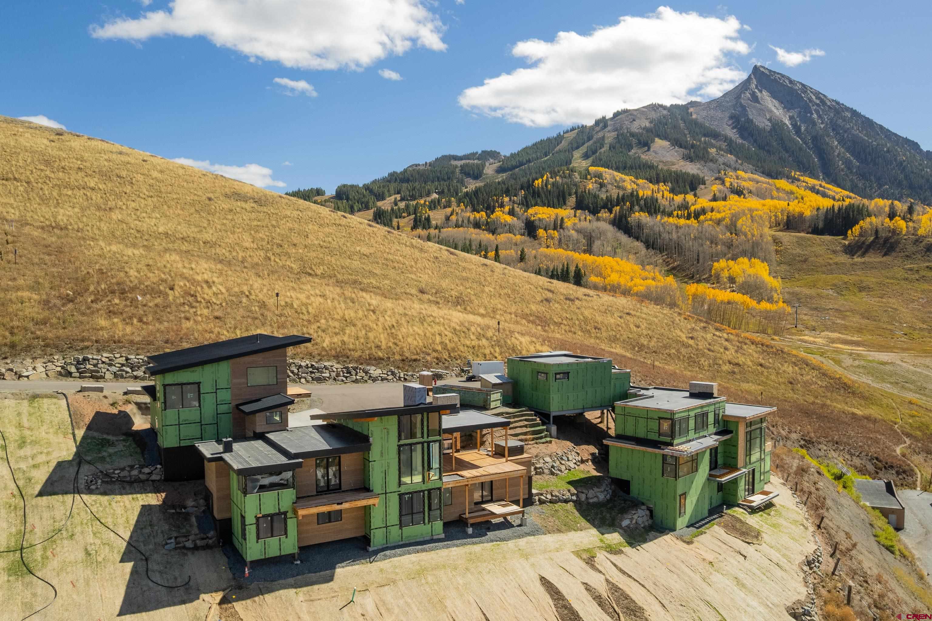 63 Cinnamon Mountain Road Crested Butte, CO 81225 - Photo 9 of 45 a view of a terrace with sitting area