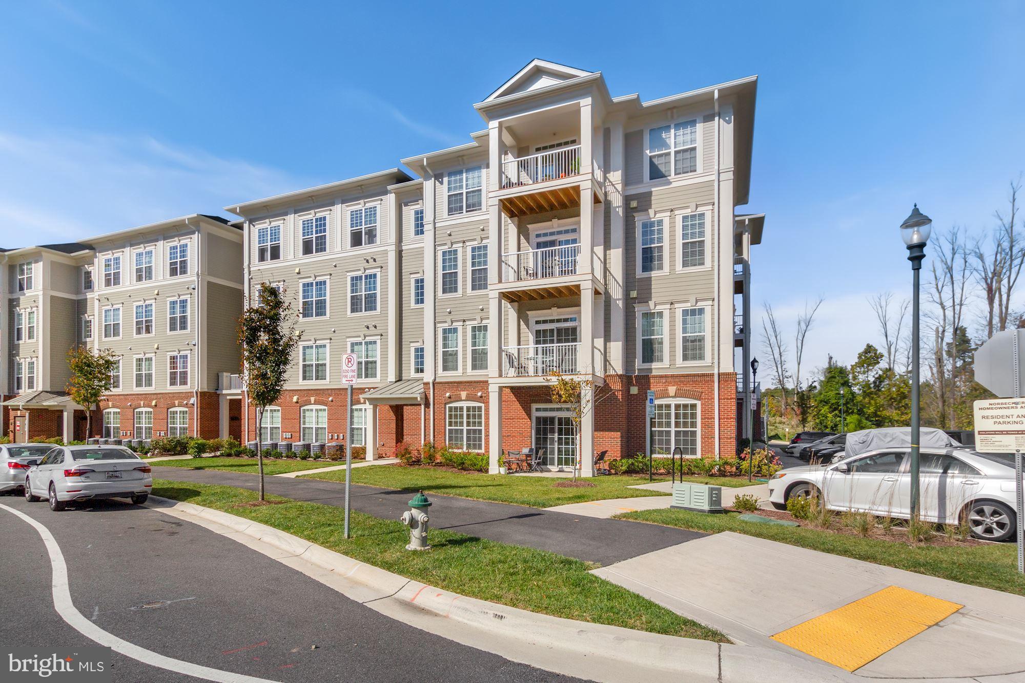 3825 Doc Berlin Drive, Unit 17 Silver Spring, MD 20906 - Photo 34 of 34 a view of a building with a swimming pool