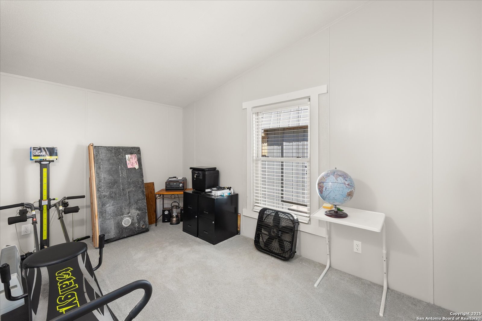 363 Elm Pass II Road East Center Point, TX 78010 - Photo 27 of 50 a room with furniture and gym equipment