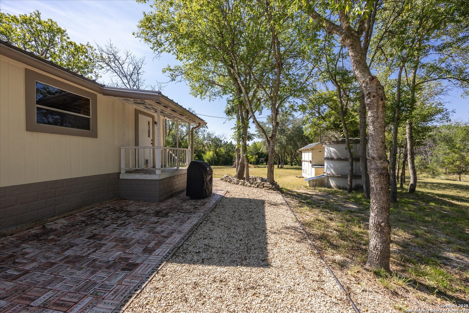 363 Elm Pass II Road East Center Point, TX 78010 - Photo 29 of 50 a view of a back yard of the house