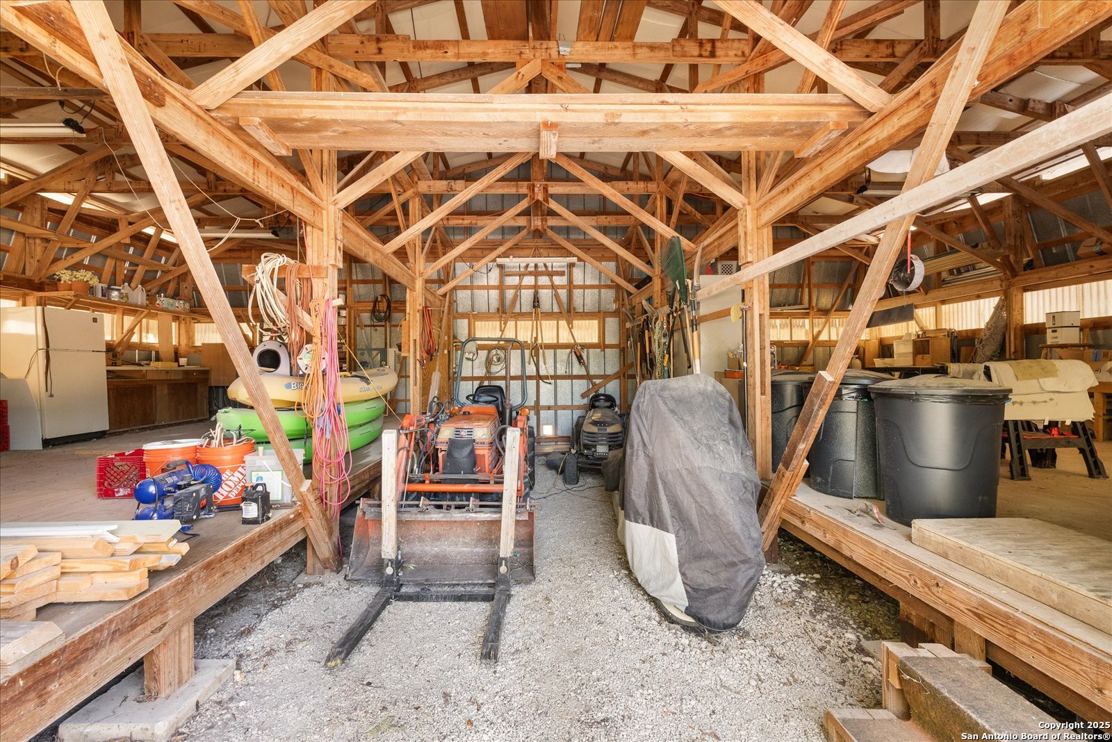 363 Elm Pass II Road East Center Point, TX 78010 - Photo 37 of 50 a view of a room with lots of furniture and a chandelier