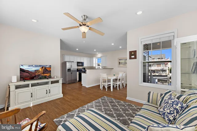 a kitchen with a sink and refrigerator