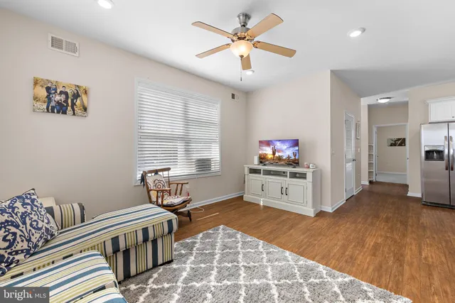 a kitchen with a table and chairs in it