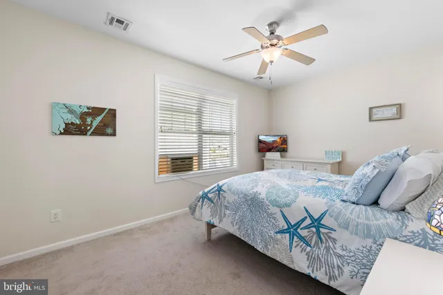 a view of a room with lots of windows