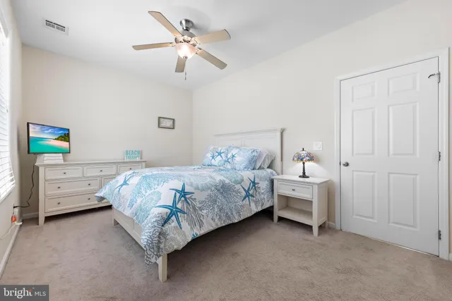 a view of a deck with chair and wooden floor