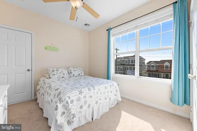 a aerial view of a house with swimming pool table and chairs