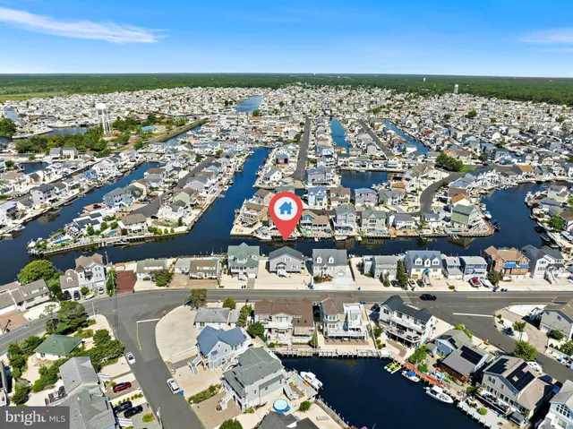 an aerial view of a city with ocean view