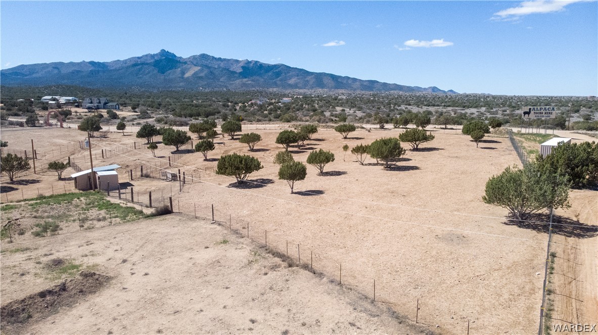 1108 South McCarrel Road Kingman, AZ 86401 - Photo 12 of 65 View of mountain backdrop featuring rural landscape and a desert landscape