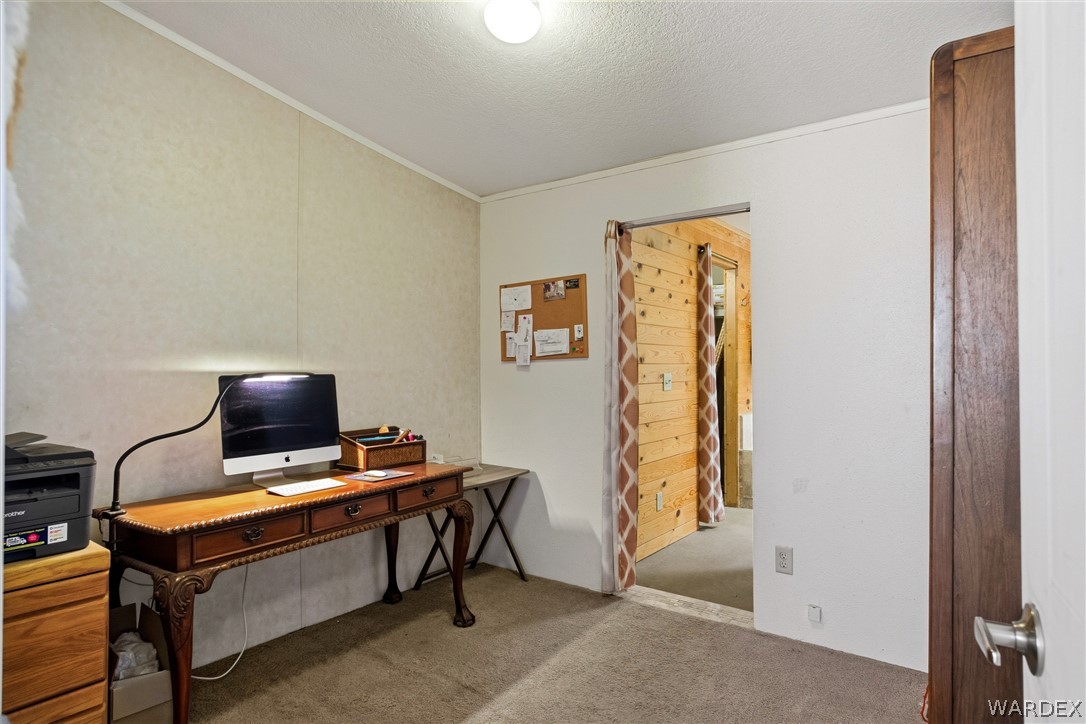 1108 South McCarrel Road Kingman, AZ 86401 - Photo 36 of 65 a view of workspace with a window