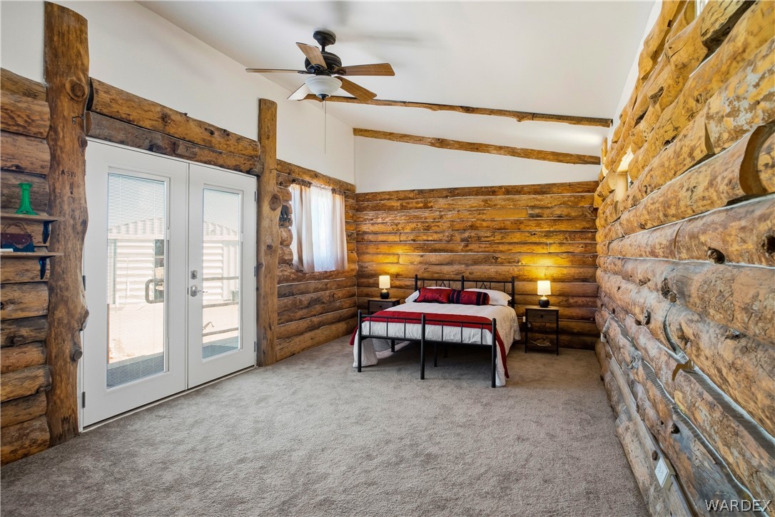 1108 South McCarrel Road Kingman, AZ 86401 - Photo 39 of 65 a bedroom with a bed and a cabinet