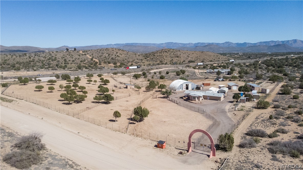 1108 South McCarrel Road Kingman, AZ 86401 - Photo 4 of 65 an aerial view of a house with a mountain