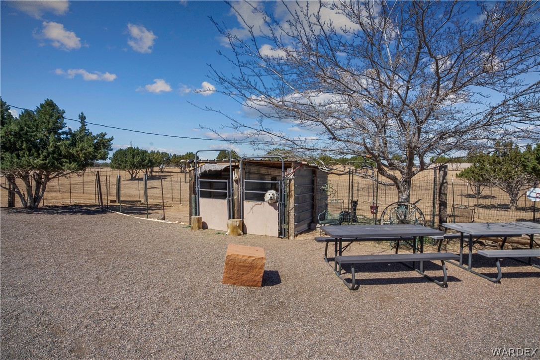 1108 South McCarrel Road Kingman, AZ 86401 - Photo 51 of 65 View of yard featuring an outdoor structure