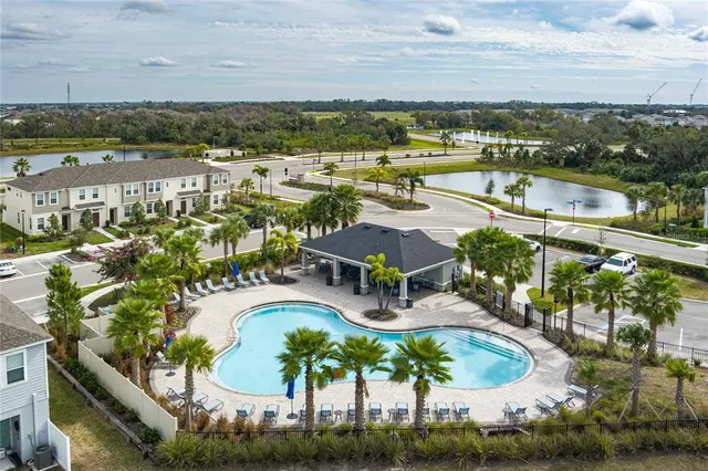 an aerial view of residential building and lake view