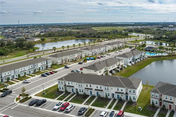 a view of a city with an ocean view